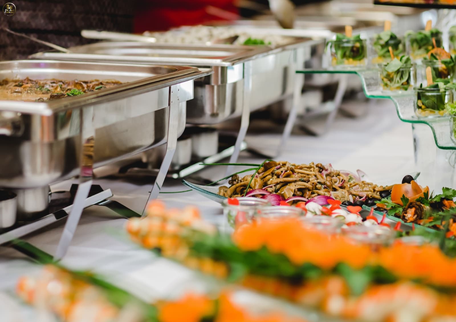 Hot buffet in chafing dishes at a corporate event