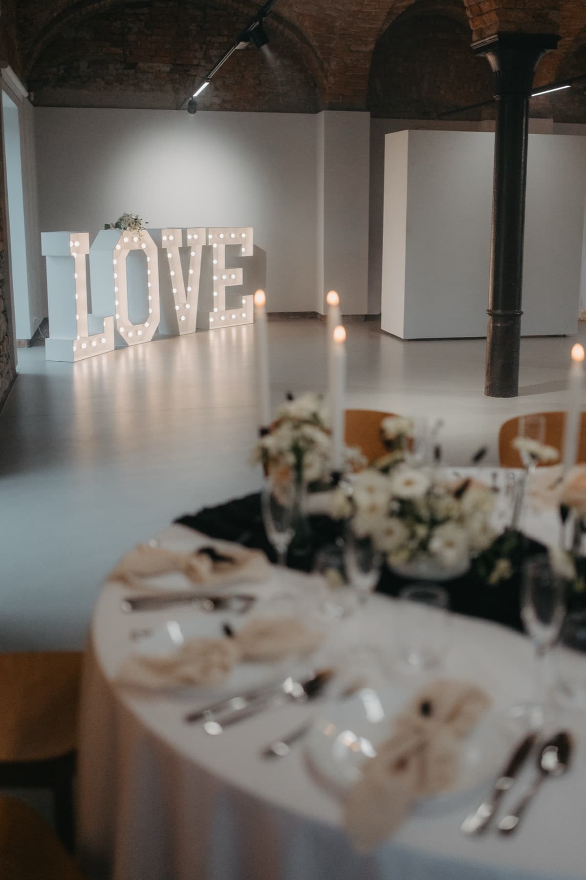 Wedding table with candles and floral decoration